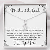 The perfect gift for mom on your wedding day.Ribbon shaped,14K white gold over stainless steel,clear crystals, a sparkling 7mm round  Cubic Zirconia. Includes heartfelt message card from daughter to Mother.